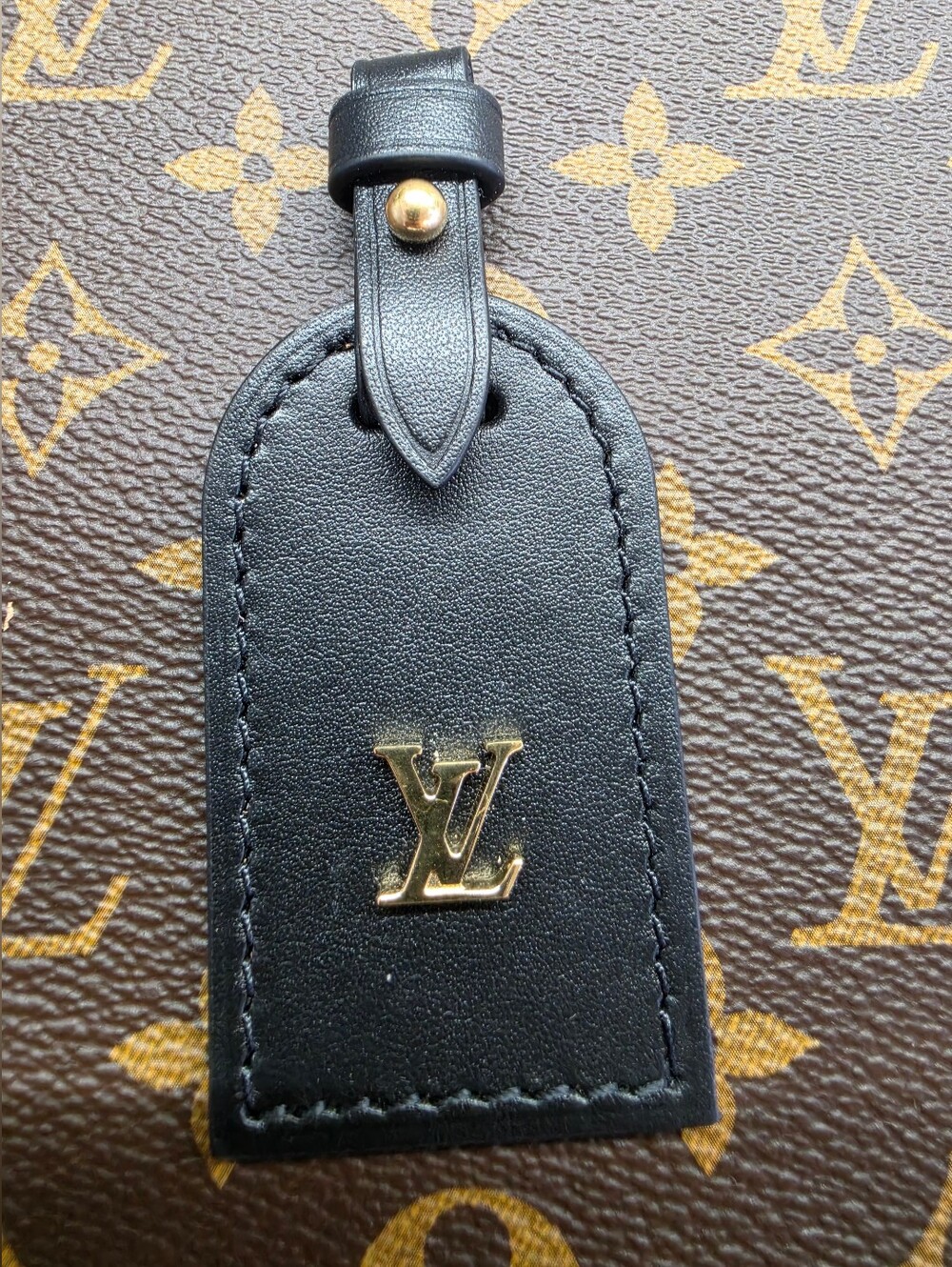 Louis Vuitton Black Leather Name Tag with Gold LV Emblem